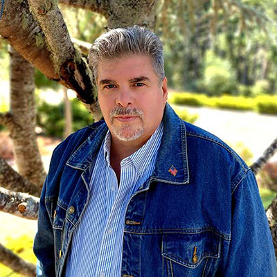 paul romero for governor in denim jacket